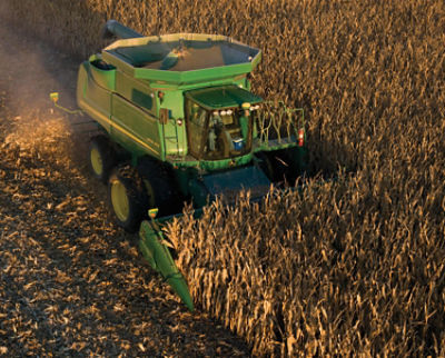 Corn harvest operation - aerial view - John Deere combine