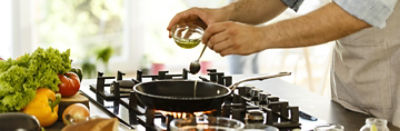 cooking with oil over stove top