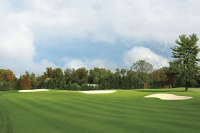 Image of a golf course with sand traps