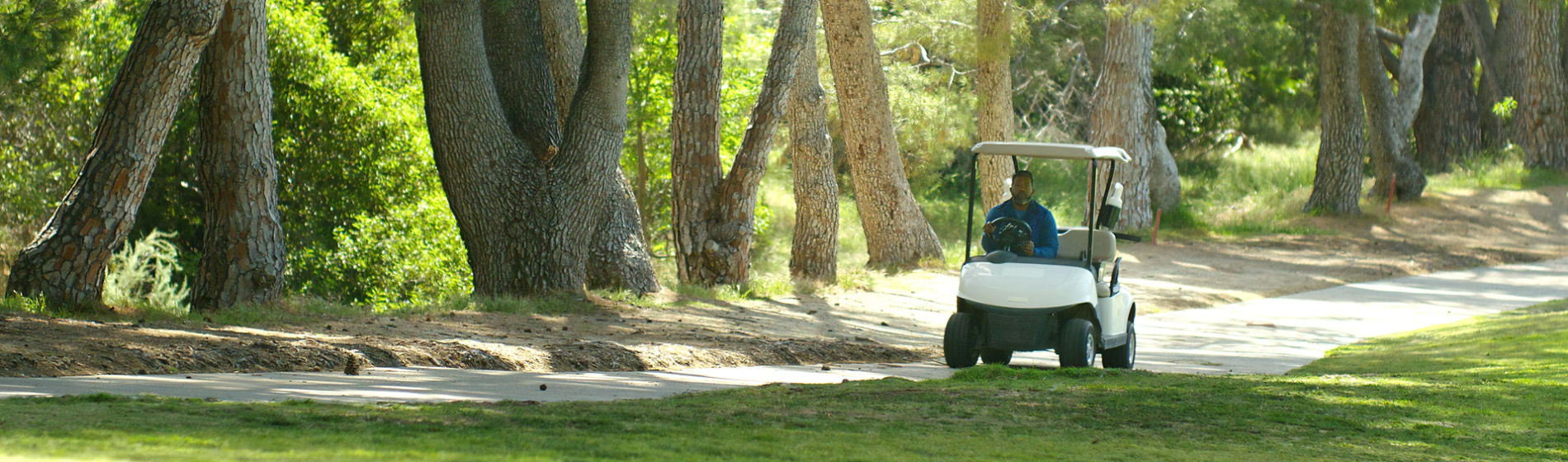golf course super in a cart
