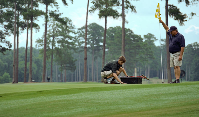 Two golf superintendents on the golf course