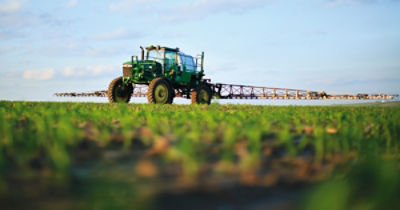 Ground level view sprayer in field