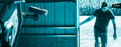 Paul Butler entering barn