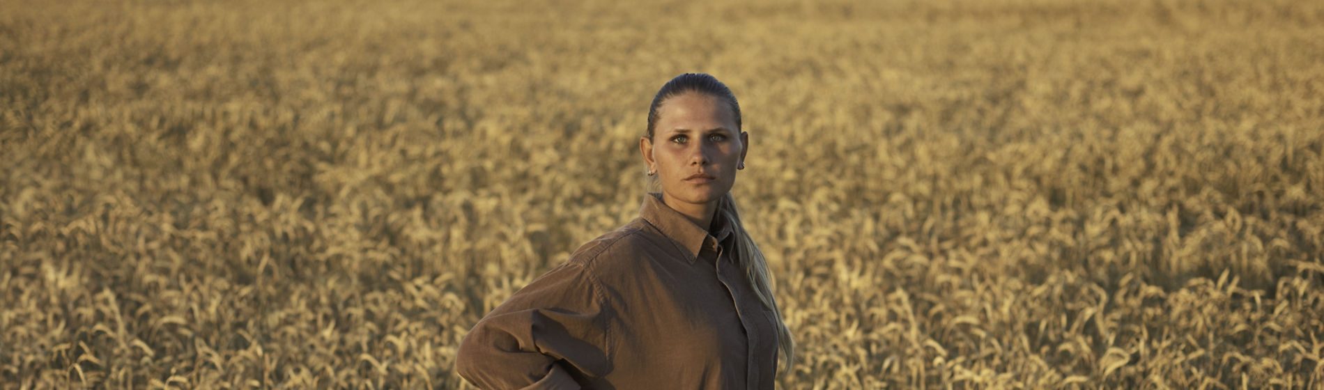 woman standing in wheat field