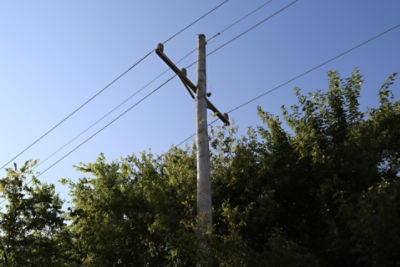 Telephone pole, sunrise