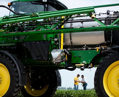 Two farmers, Sprayer, Soybean field