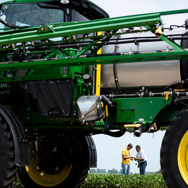 Two farmers, Sprayer, Soybean field