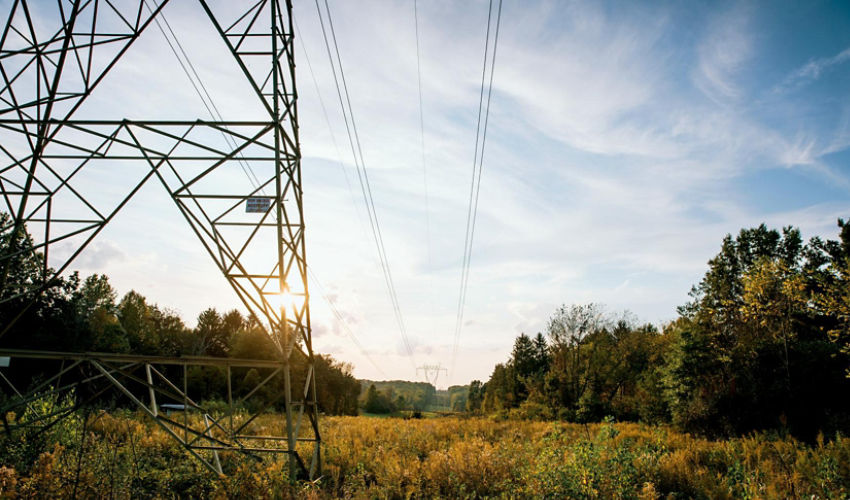 Utility tower at sunrise, clean ROW