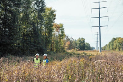 Two utility vegetation managers in a utility ROW