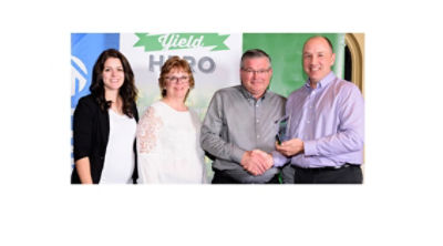 Yield Hero winners being presented with their trophy. 