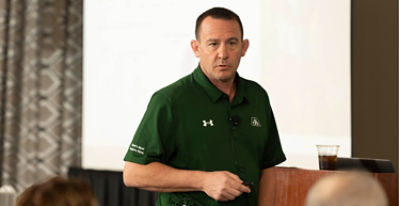 Corteva Canada Vice President Jeremy Dirks giving a speech at a Yield Hero event.