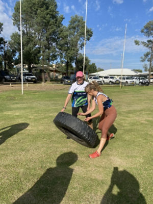 Karen and Amelia in the Tractor Tyre toss