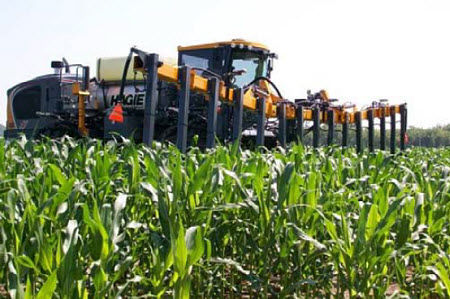 High-clearance applicator with a crop sensor directing in-season N application.