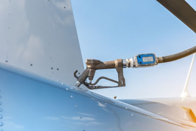 fuel pump in tank with blue sky background