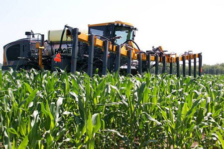 High-clearance applicator with a crop sensor directing in-season N application.