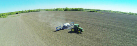 Planting a Pioneer multi-hybrid trial in 2015.