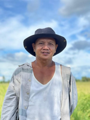 farmer wearing black hat