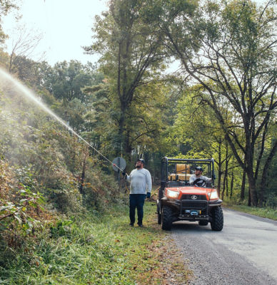 man using water hose