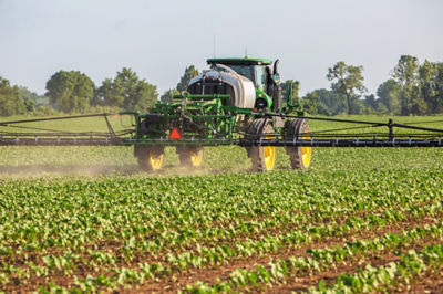Image of cotton field being sprayed with herbicide