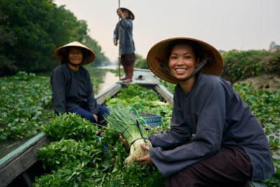 Women farmers showcasing their crops