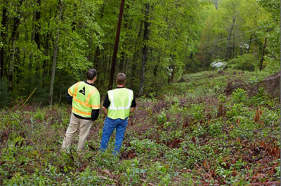 Two men looking down rights-of-way