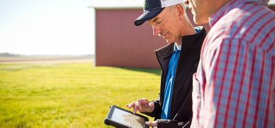 Men looking at tablet