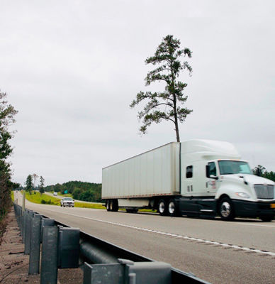 semi driving on highway